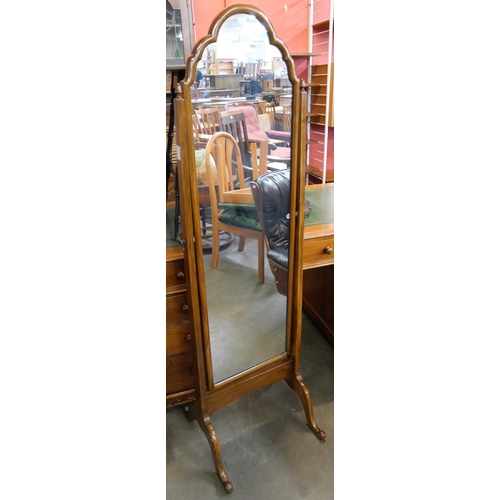 157 - A Queen Anne style walnut cheval mirror