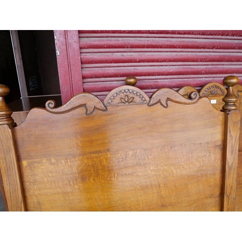 158 - A pair of Nigel Griffiths Jacobean Revival carved oak single beds beds