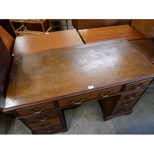 180 - A Victorian mahogany pedestal desk