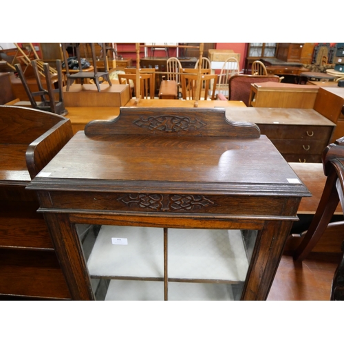 181 - Ann early 20th Century carved oak display cabinet