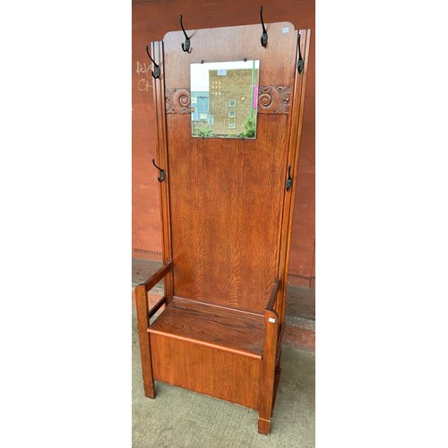 137 - An early 20th Century oak hallstand