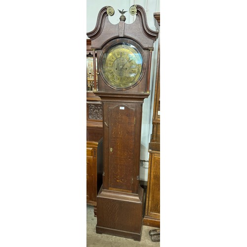 140 - A 19th Century oak 8-day longcase clock, the circular brass dial signed R. Todd, Scarborough