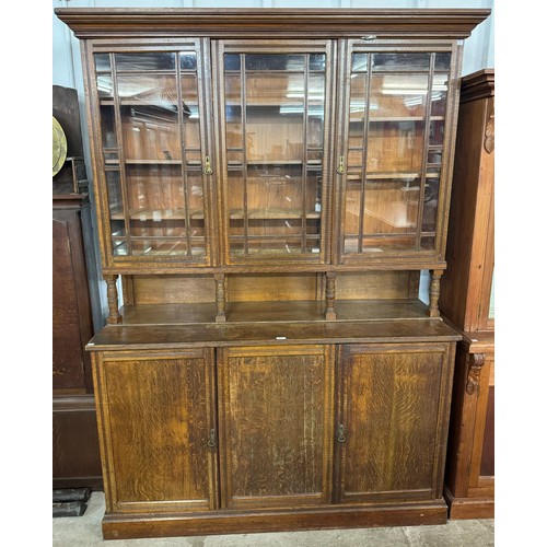 141 - A late Victorian oak bookcase