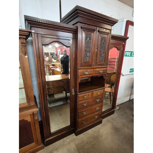 143 - An Edward VII walnut combination wardrobe