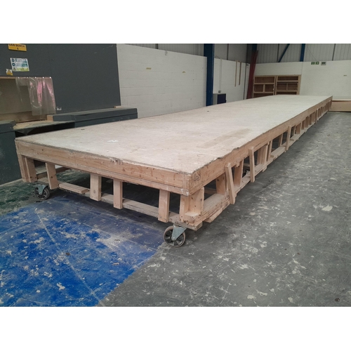 2 - A large mobile workbench measuring 12.5m x 2.6m x 0.65m (LWH). The bench was designed to allow assem... 