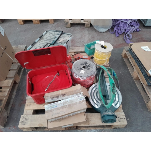 33 - A pallet of facility and maintenance items including a parts washer, safety chain and a beam clip. I... 