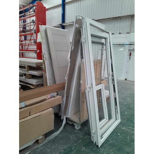 7 - Thirteen pallets holding approximately 260 exterior doors in total. Manufacturers include Howdens, I... 