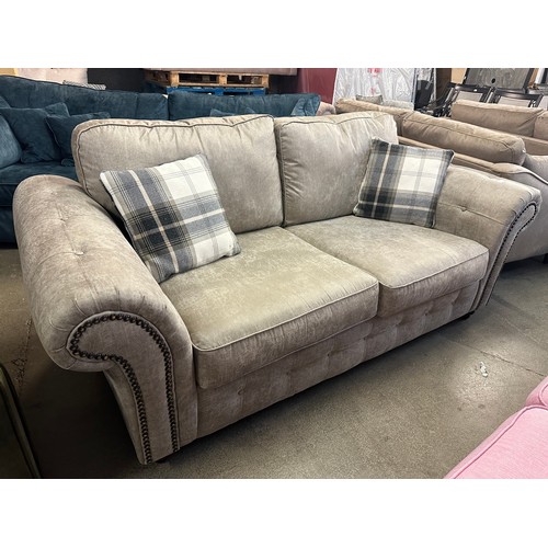 1505 - Light tan vegan leather three seater sofa