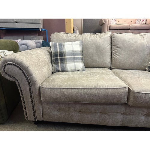 1505 - Light tan vegan leather three seater sofa