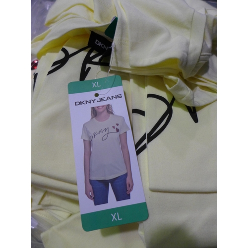 3047 - Quantity of women's lemon DKNY T-shirts - mixed size * this lot is subject to VAT