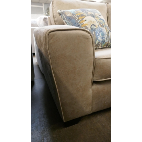 1314 - A Champagne PU suede three seater sofa, two seater sofa and armchair