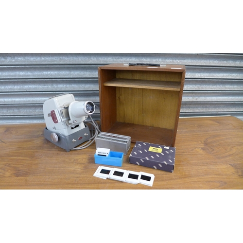 2283 - A vintage Aldis Anastigmat slide projector, an Argus automatic slide changer, an Aldis standard film... 