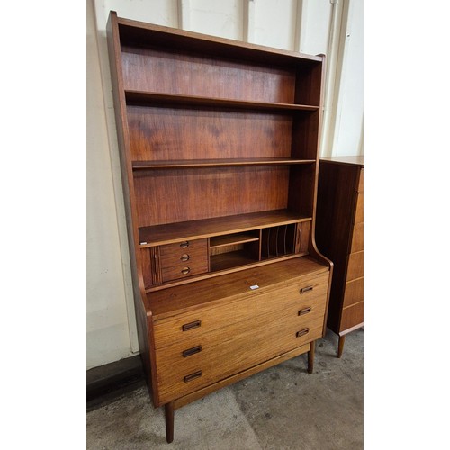 22 - A Danish Borge Mogensen teak tambour front secretaire bookcase