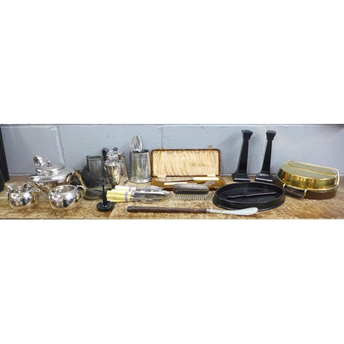 1014 - A set of Salter scales, wall mounted, other metalwares including tea service and cutlery, ebony dres... 