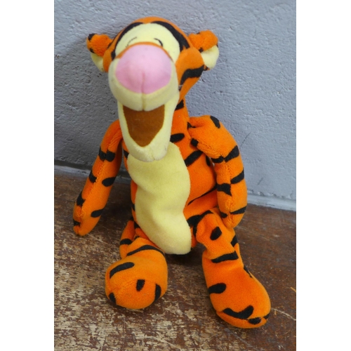 Four battery operated Disney character soft toys and a Tigger soft toy ...