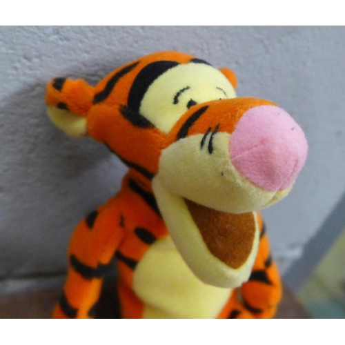 1019 - Four battery operated Disney character soft toys and a Tigger soft toy **PLEASE NOTE THIS LOT IS NOT... 