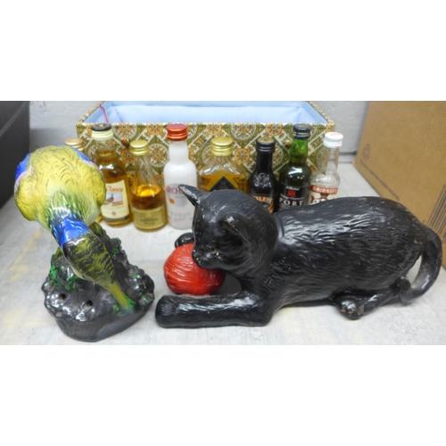 1021 - A vintage Bretby cat and ball of wool figure, a Bretby kingfisher, a collection of spirit miniatures... 