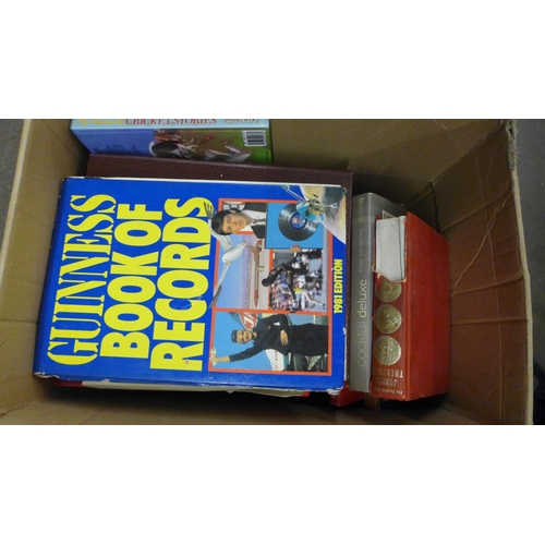 1033 - A collection of approximately 80 books in four boxes **PLEASE NOTE THIS LOT IS NOT ELIGIBLE FOR IN-H... 