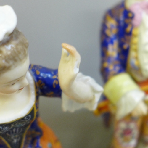 601 - A pair of Derby porcelain figures, a German porcelain figure group and two other porcelain figures i... 