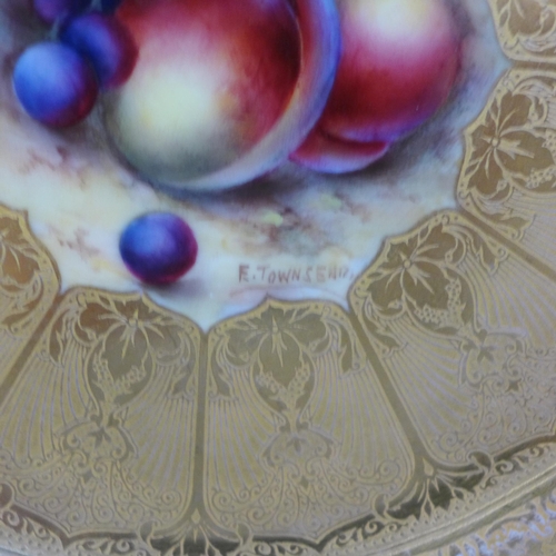 609 - A Royal Worcester gold cabinet plate with central still life painting of fruit, signed E. Townsend