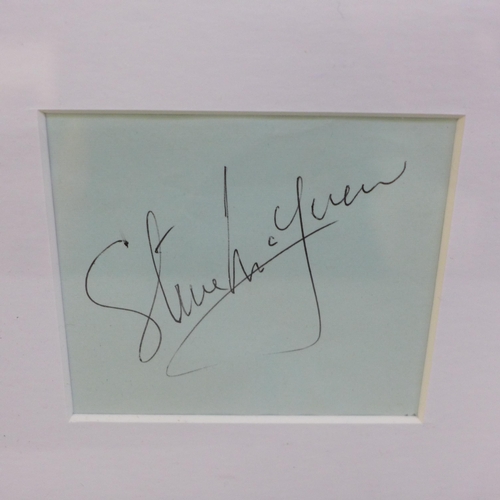 616 - A framed Steve McQueen photograph with signature