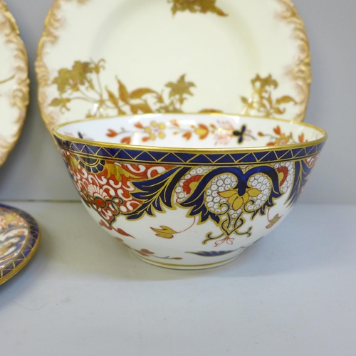 628 - A 19th Century Derby King's Imari slop bowl, tea pot stand and a pair of Crown Derby floral gilded s... 