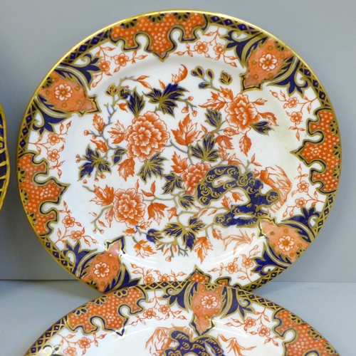 634 - 19th Century Derby; a pair of Derby 2224 Imari tea plates, Derby 919 Imari tea plate and a 1888 side... 