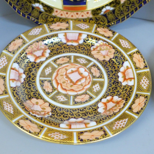 634 - 19th Century Derby; a pair of Derby 2224 Imari tea plates, Derby 919 Imari tea plate and a 1888 side... 