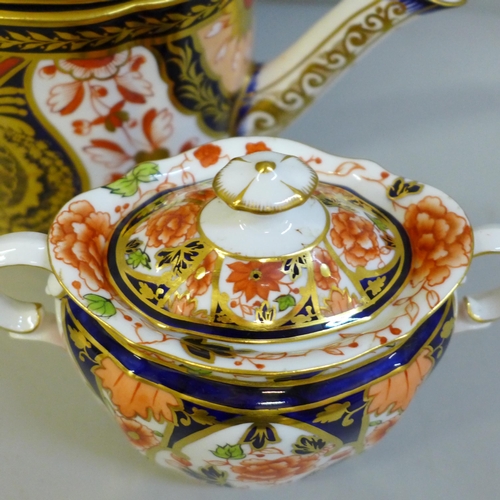 653 - A circa 1880s Derby 1384 Imari teapot and a later Royal Crown Derby sucrier (teapot lid may possibly... 