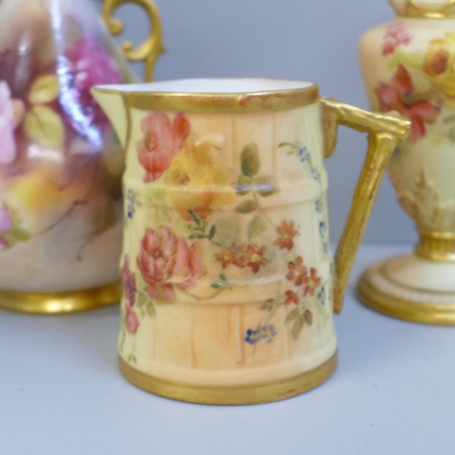 654 - A Royal Worcester blush ivory small pitcher and two vases, all decorated with flowers