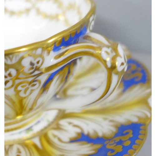 655 - A 19th Century Spode Imari cylindrical pot and cover, a Royal Crown Derby vase decorated with flower... 