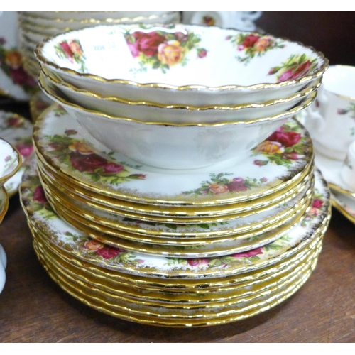 658 - A large collection of Royal Albert Old Country Roses tea and dinner wares, including six dinner, sev... 