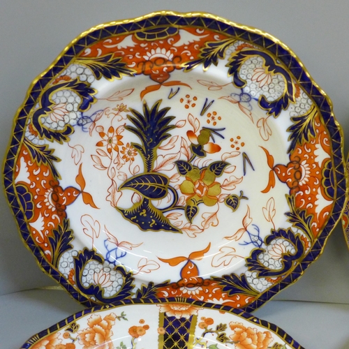 673 - A 19th Century Copeland Imari cabinet plate, soup bowl, a pair of Royal Crown Derby 6041 Imari tea p... 