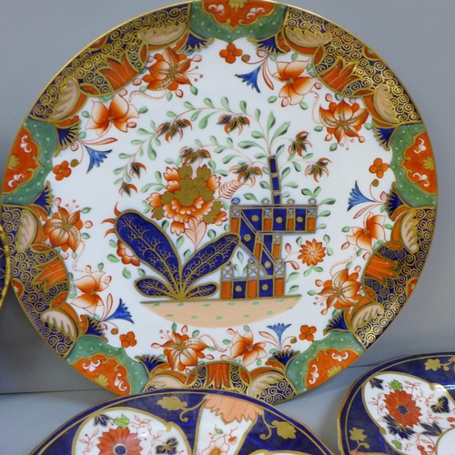 673 - A 19th Century Copeland Imari cabinet plate, soup bowl, a pair of Royal Crown Derby 6041 Imari tea p... 