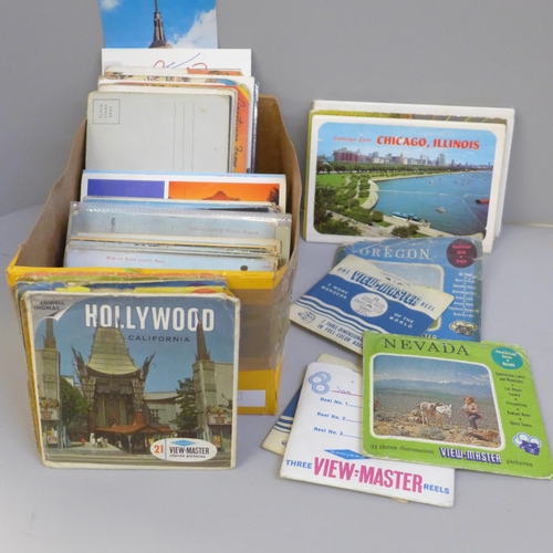 675 - A box of USA postcards and View Master reels