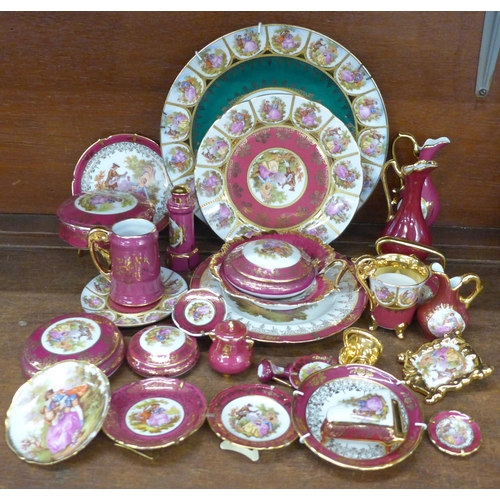 692 - A large collection of Limoges porcelain, approximately thirty pieces