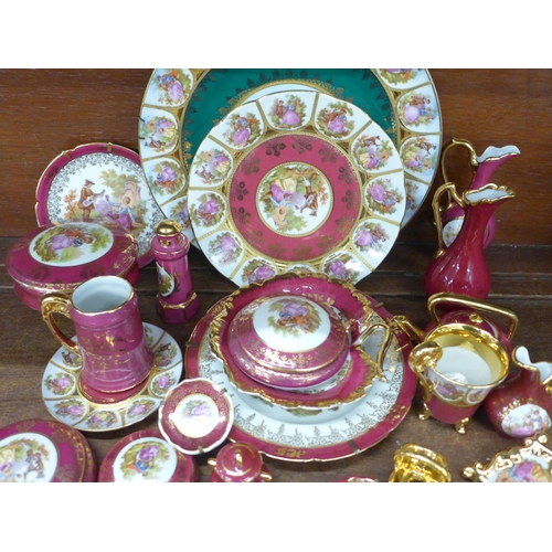 692 - A large collection of Limoges porcelain, approximately thirty pieces