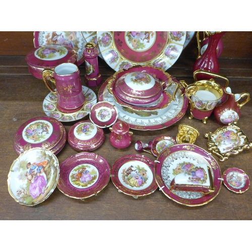 692 - A large collection of Limoges porcelain, approximately thirty pieces