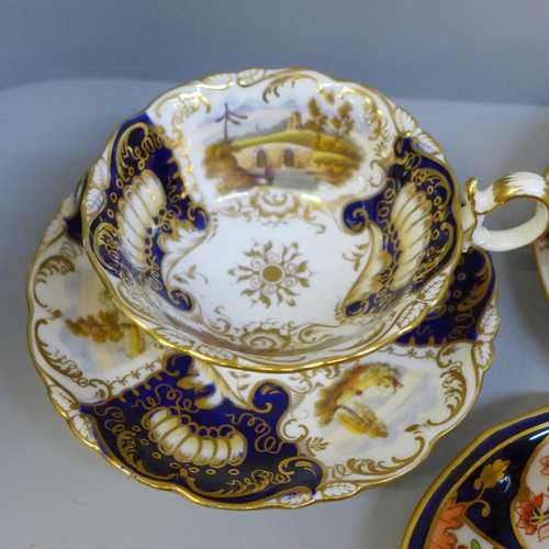 696 - A collection of Derby and Royal Crown Derby Queen's Imari cabinet cups and saucers; two with tea pla... 