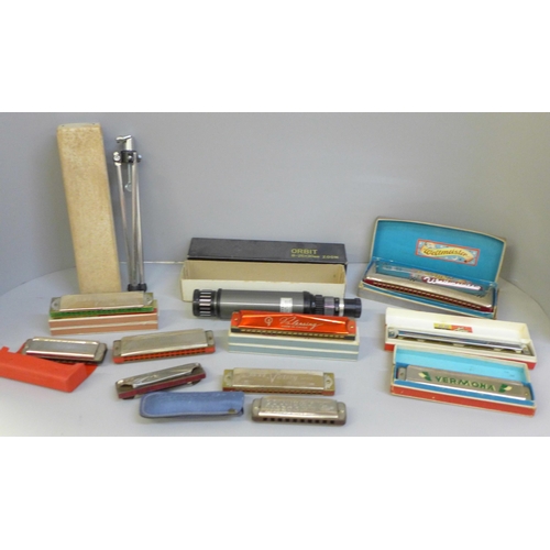 697 - A box of mixed harmonicas including a large Weltmeister plus an Orbit 8-25x30mm scope and tripod