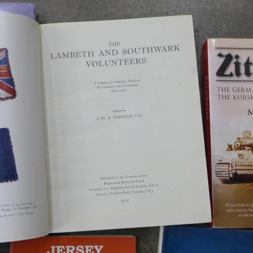 702 - Twelve WWI and WWII books including Lambeth and Southwark Volunteers, Price of Glory, Verdun 1916