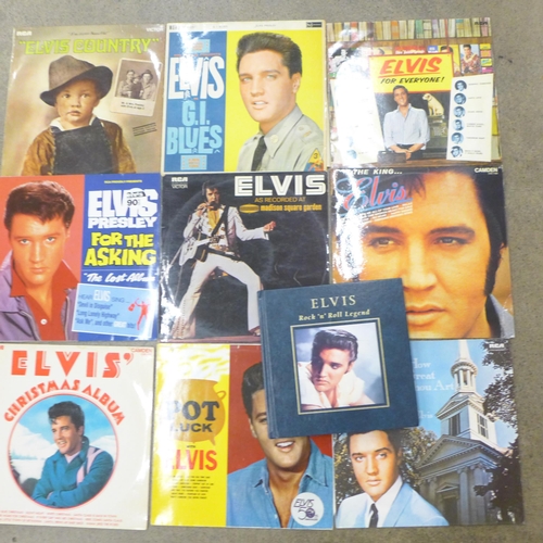 705 - Nineteen Elvis Presley LP records and a book, 'Rock 'n' Roll Legend