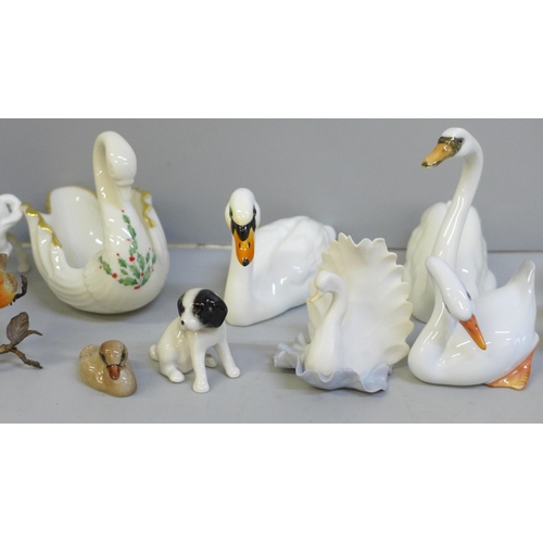 706 - A box of fine china swan figures, Beswick, Hutschenreuther, Albany China robin and wren, beak on rob... 