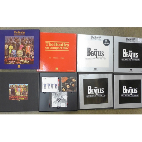 709 - Four The Beatles compact disc sets, limited edition, boxed