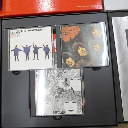 709 - Four The Beatles compact disc sets, limited edition, boxed