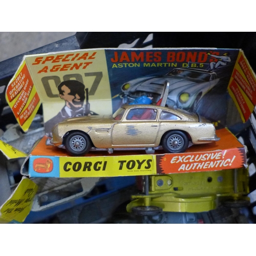 722 - A collection of mostly Dinky and Corgi die-cast model vehicles including Corgi James Bond Aston Mart... 