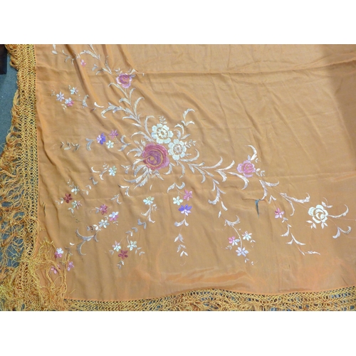 735 - An orange silk shawl with embroidered flowers, 1.4m square, Spanish, 1930s