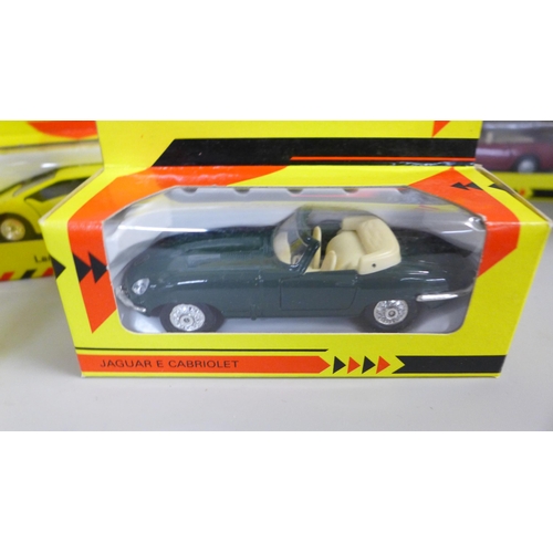 742 - Fourteen Classic sports car collection die cast model vehicles, and three Maisto model vehicles, all... 