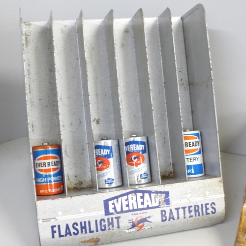 747 - One Vintage 'Eveready' flashlight batteries display metal stand, plus four batteries and a vintage w... 