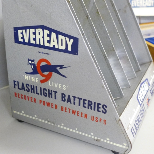 747 - One Vintage 'Eveready' flashlight batteries display metal stand, plus four batteries and a vintage w... 